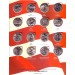 Набор монет 25 центов США (квотеры) серии "Штаты и территории" в альбоме. 25 центов, США, 1999-2009 год.